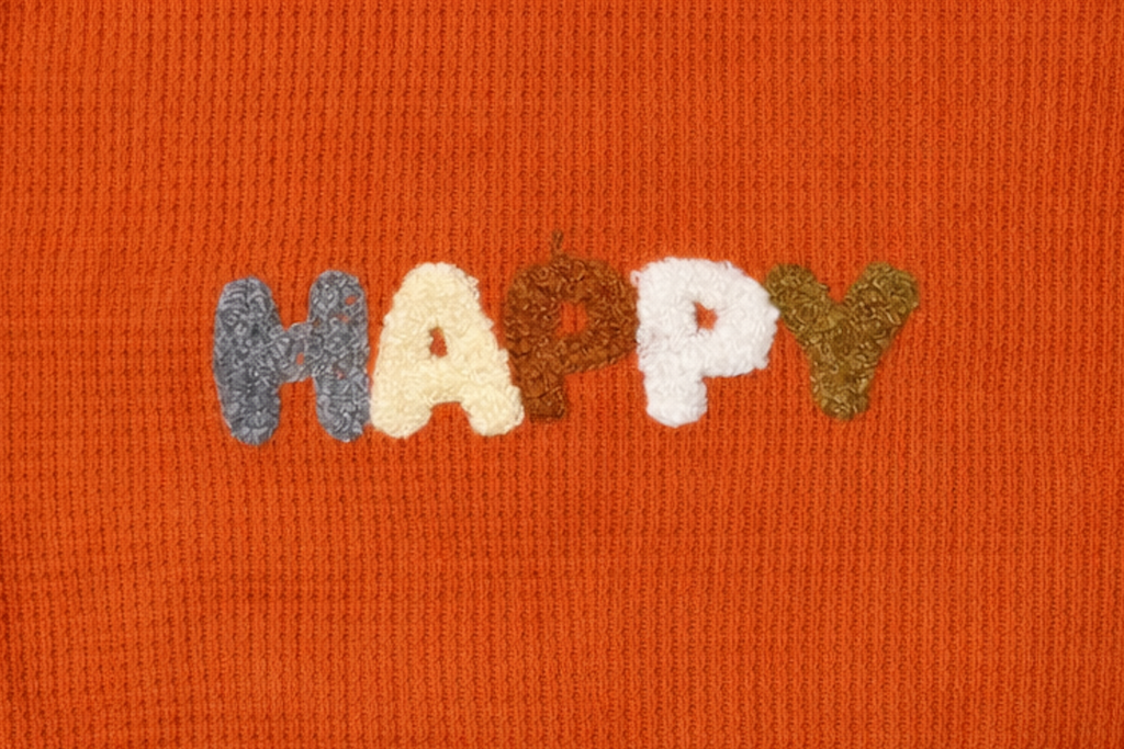 Pull bébé orange « HAPPY » – 100 % coton 🧡